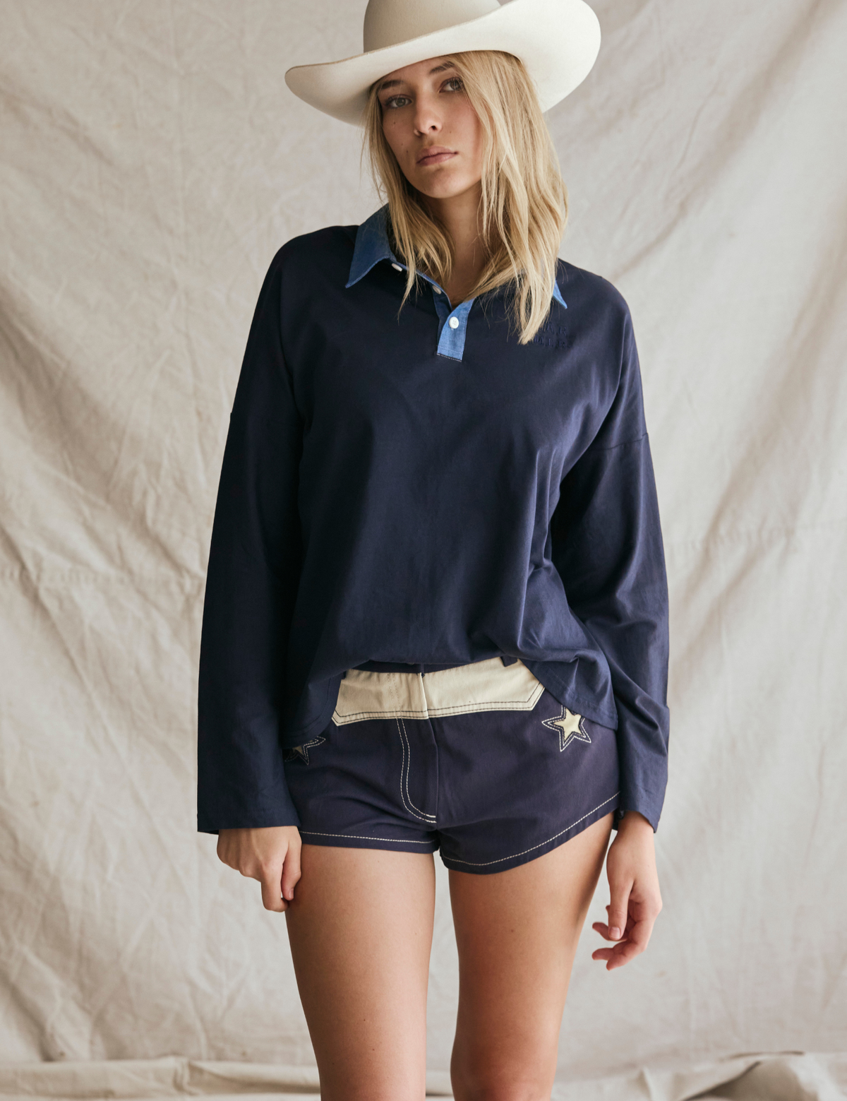 far-mer-by-whitney-navy-polo-3_1200x_e23c86d8-d52a-4de4-8297-cf596e1b71c7.png
